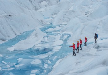 Photo of Juneau Helicopter Glacier Trek Pointing out a Crevase