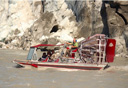 Photo of airboat and glacier