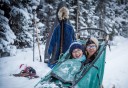 Photo of couple in dog sled