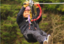 Photo of man ziplining