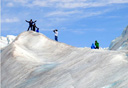 Photo of people exploring glacier