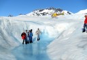 Photo of people walking on glacier