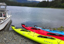 Photo of sitka kayaks on shore