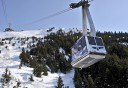 Photo of wintery tram ride up the mountain